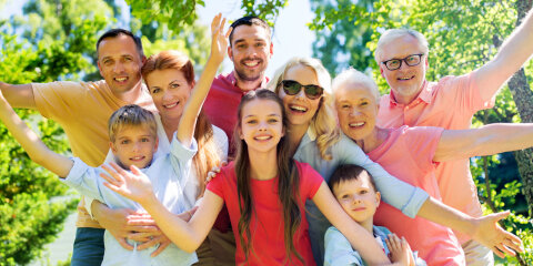 happy family portrait in summer garden