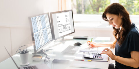 Accountant Using E Invoice Software At Computer