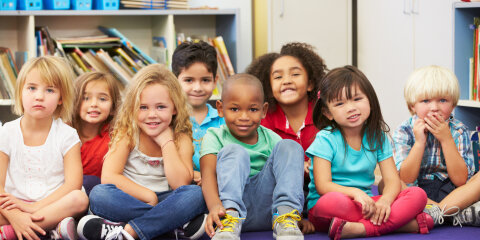 Group of Elementary Pupils In Classroom