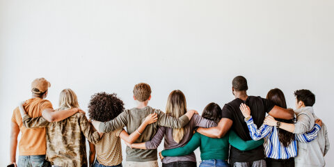 Group of people supporting each other