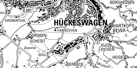 Ausschnitt einer schwarz-weißen topografischen Karte der Region Hückeswagen. Beschriftungen zeigen Ortsnamen wie Großen-Scheidt, Klein-Eichen und Hartkopsbever sowie Straßen und geografische Merkmale.