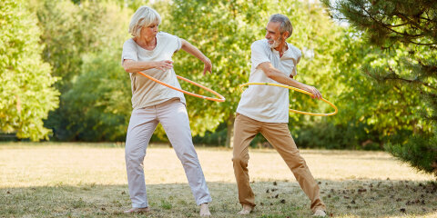 Seniors training with hula hoops