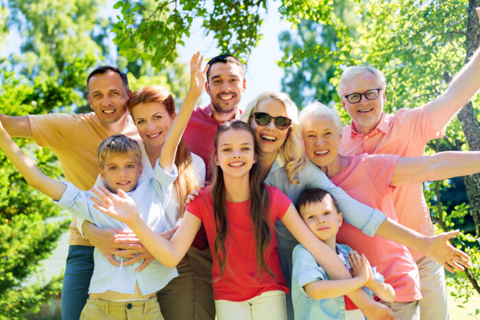 happy family portrait in summer garden